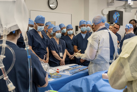 group of surgeons in operating room